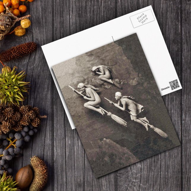 Postal Vintage Three Halloween Witness Flying Brooms (Three witches all in white flying on brooms on shades of brown postcard.)