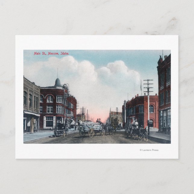 Postal Vista de la calle principal y de los transportes d (Anverso)