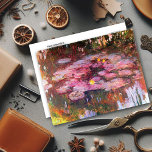 Postal Water Lilies Flores Amarillas Claude Monet<br><div class="desc">Postal de arte fino con la pintura impresionista del paisaje,  Water Lilies (1917) de Claude Monet (1840-1926). Un estanque de colchonetas de lirio rosado con flores amarillas. Monet produjo muchas pinturas de nenúfares desde sus propios jardines en Giverny,  Francia.</div>
