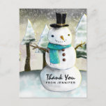 Postal Whimsical Snowman Winter Scene Christmas Thank You<br><div class="desc">Thank you postcard with a cute drawing featuring a snowman wearing a cool top hat and scarf. The background has a line of whimsical snow-covered pine trees.</div>