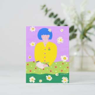 Postal Woman reading in the garden