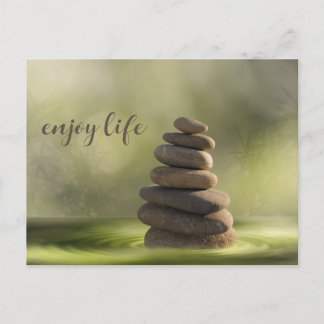 Postal Zen stones tower in water tranquility and calm