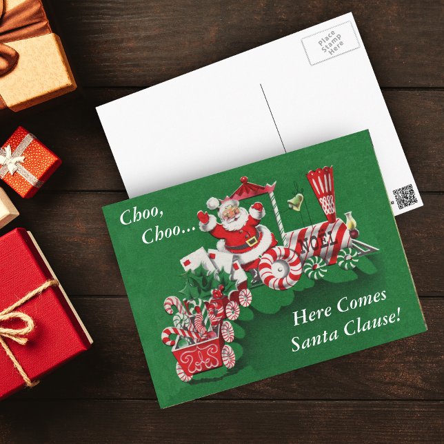 Postales de tren de Santa Navidades (Santa Riding peppermint candy train with letters, candy canes on green Christmas postcard.)