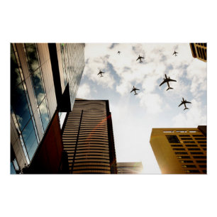 Póster Aeroplanos que vuelan sobre edificios