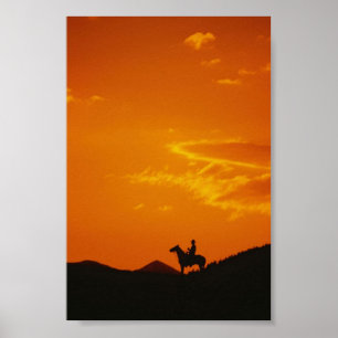 Póster Atardecer naranja con Silhouette Cowboy