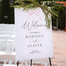 Bienvenida de boda con monograma de lazo rosa mode