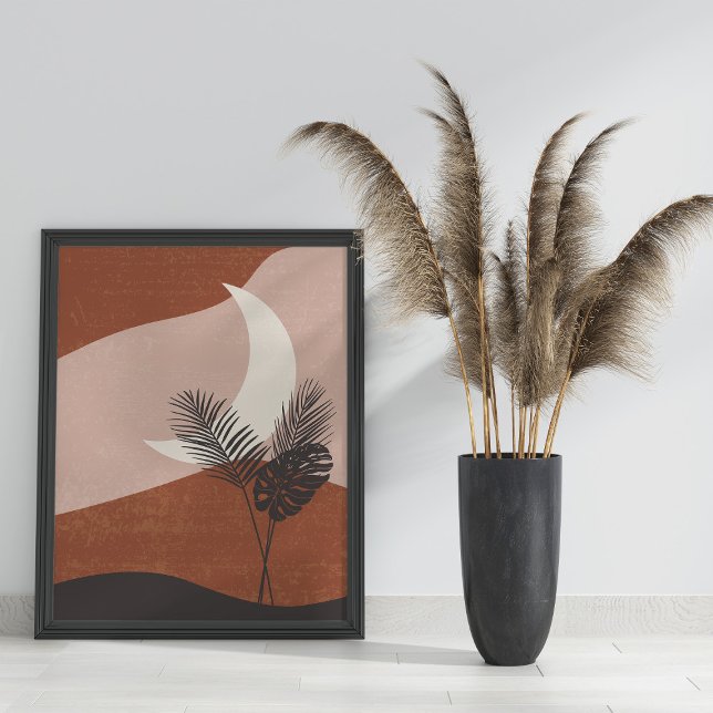 Póster Boho Resumen de la Luna de Paisaje de Terracota (Boho Abstract Terracotta Landscape Moon Poster in black frame on the floor next to pampas grass)