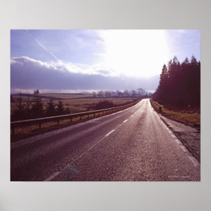 Póster Carretera principal con bajo sol invernal.