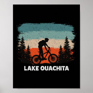Póster Ciclismo de montaña en el lago Ouachita al atardec