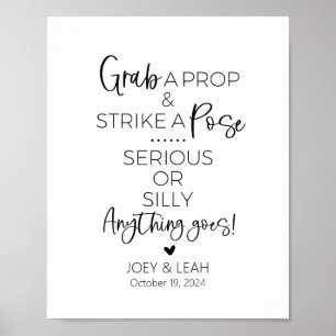 Póster Coge un Rótulo de la cabina fotográfica de un palo