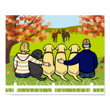 Cuatro labradores y padres en otoño