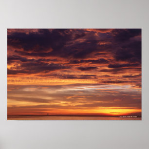 Póster Dark clouds in orange streaked sky
