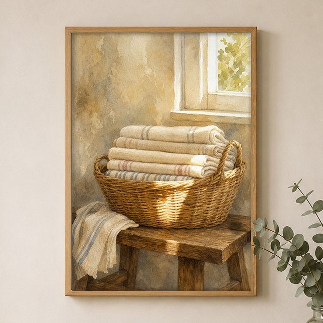 Póster de acuarela de cesta de mimbre con ropa bla (Shown framed for scale. Poster ships unframed; frames are an optional add-on.)