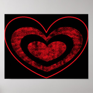 Póster de corazón rojo y negro colgando en la pare