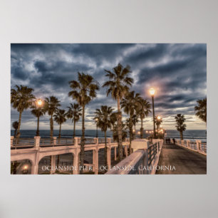 Póster Embarcadero de la costa en la puesta del sol