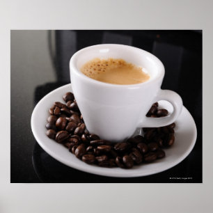 Póster Espresso cup on black granite counter