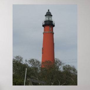 Póster Faro de Ponce Inlet sobre los árboles