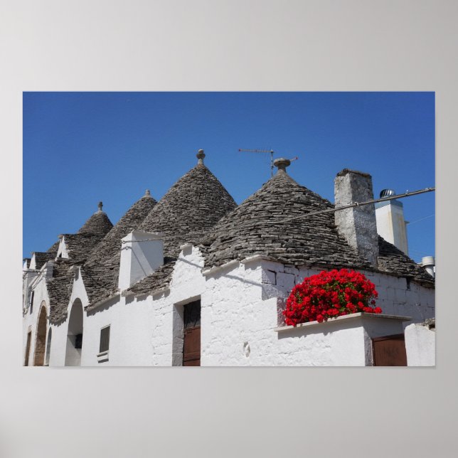 Póster Flores de geranio y casas de trullos en Alberobell (Frente)