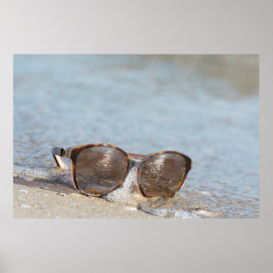 Póster Gafas de sol en la playa