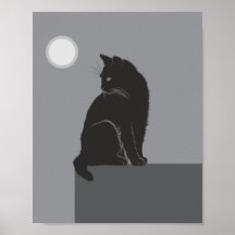 gato negro sentado en la mesa