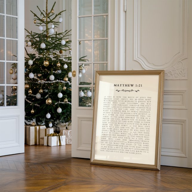 Póster Historia del Nacimiento de Navidad Mateo 1:21 Impr (Against the wall, there is a framed Christian scripture print about nativity story Matthew 1:21.)