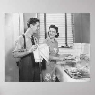 Póster Hombre y mujer que hacen platos