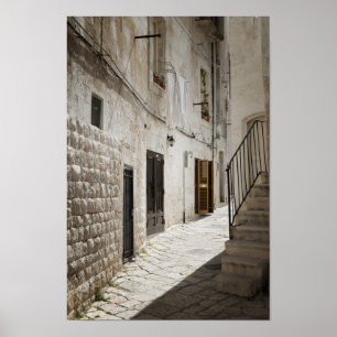 Póster Lavandería colgando para secar en un callejón en I