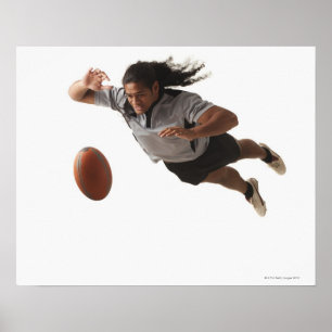 Póster Male rugby player diving for ball