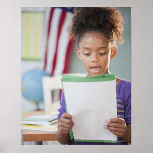 Póster Mixed race girl reading report at school