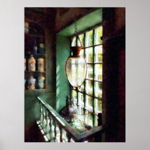 Póster Mortero de vidrio y pestle en Windowsill