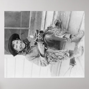 Póster Muchacho joven vestido como vaquero con los