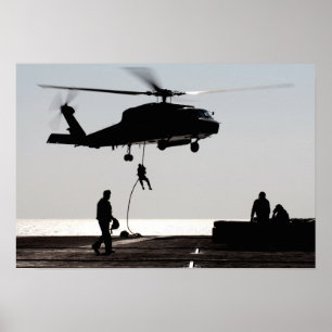 Póster Personnel fast-rope out of an SH-60F