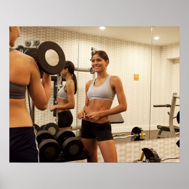 Póster Pesas de elevación en el gimnasio (Frente)