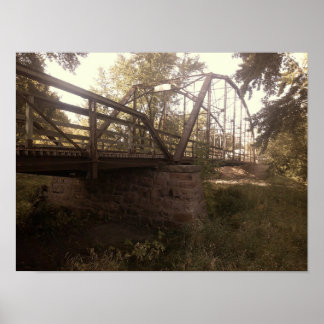 Póster Photograph of an old, rusty iron truss bridge
