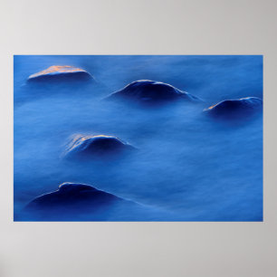 Póster Puesta de sol sobre rocas que sobresalen a través