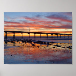 Póster Puesta del sol en la playa del océano