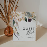 Póster Rótulo del libro de huéspedes con flores blancas<br><div class="desc">Diseñamos este Rótulo de Libros de Huéspedes de Floral Blanca para completar su boda tropical oscuro y rústico. Con su vegetación bohemia acuática y sus modernas flores bohemias de invierno, como protea, dahlia y loto seco, el diseño seguro que desprenderá su temática verde y blanca minimalista. Cambie el texto y...</div>