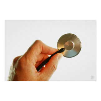 Póster Stethoscoop in een hand voor een ziekenhuis sfeer.