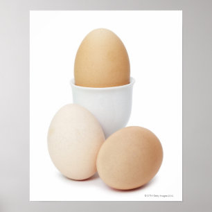Póster Three eggs isolated on a white background