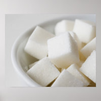 Toma de estudio de cubos de azúcar en el tazón