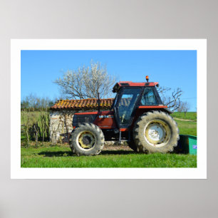 Póster Tractor en una granja en Francia
