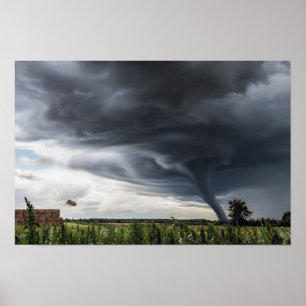 Póster Twister lifting hay bales in a storm