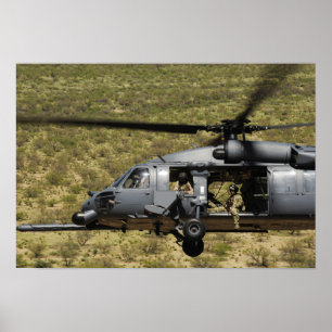 Póster Un HH-60 pavimenta el halcón vuela sobre el