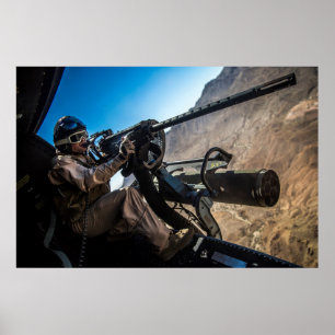 Póster Un pistolero marino se descarga en un blanco