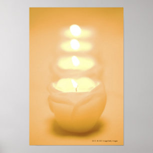 Póster Una hilera de velas encendidas