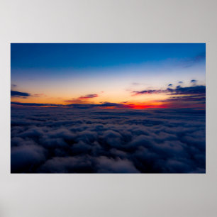 Póster Vista aérea de la puesta de sol sobre las montañas