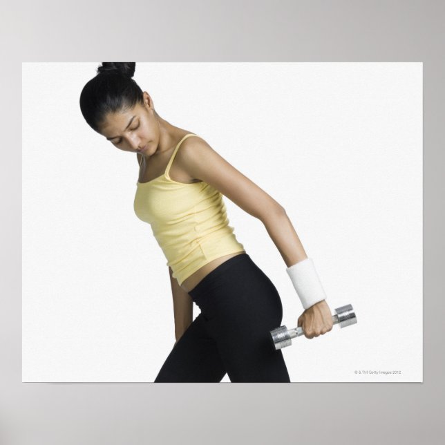 Póster Young woman exercising with a dumbbell (Frente)