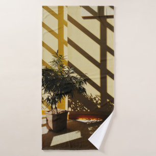 Potted green plant on brown wooden table