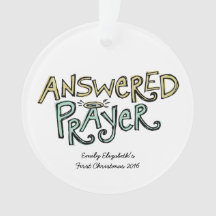 Primer ornamento del navidad del bebé contestado