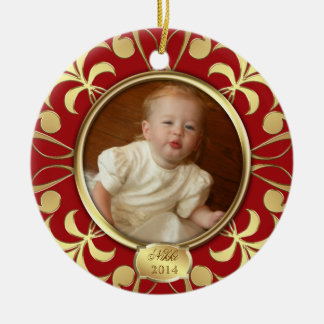 Primer ornamento del navidad del bebé rojo de la